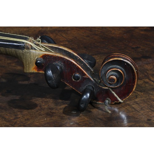 2560 - A violin, the two-piece back 35.5cm long excluding button, ebonised tuning pegs, outlined throughout... 