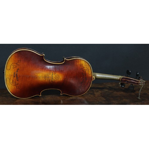 2560 - A violin, the two-piece back 35.5cm long excluding button, ebonised tuning pegs, outlined throughout... 