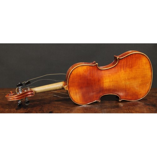 2567 - A violin, the two-piece back 36cm long excluding button, ebonised tuning pegs, 60cm long overall, th... 