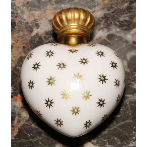 237 - A Lynton porcelain heart shaped scent bottle, painted by Stefan Nowacki, monogrammed, with a musical... 