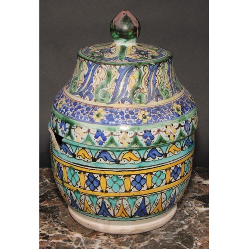 351 - A pair of 19th century Moroccan earthenware Jobbana or cheese/butter jar and cover, decorated in pol... 