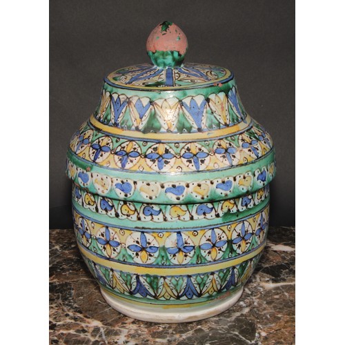 351 - A pair of 19th century Moroccan earthenware Jobbana or cheese/butter jar and cover, decorated in pol... 