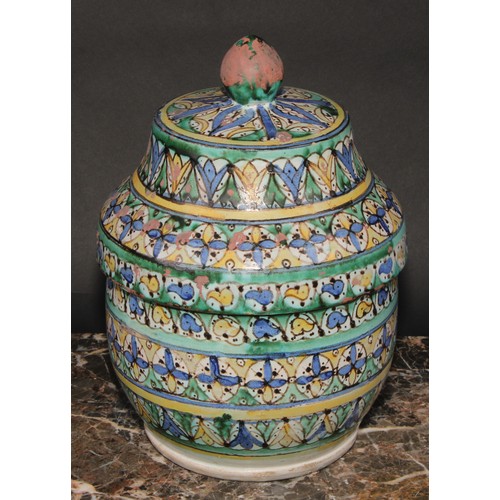 351 - A pair of 19th century Moroccan earthenware Jobbana or cheese/butter jar and cover, decorated in pol... 