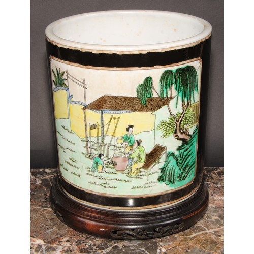 425 - A large Chinese bitong brush pot, painted in polychrome with silk makers at work, on a noir ground, ... 