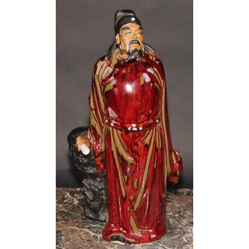 449 - A Chinese slip-cast figure, Wang Jian, 32cm high