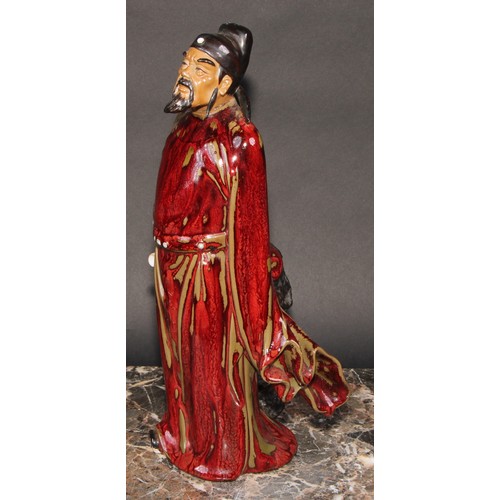 449 - A Chinese slip-cast figure, Wang Jian, 32cm high