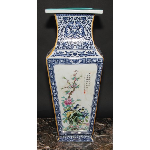 343 - A large Chinese tapered square vase, decorated in polychrome enamels with panels of fanciful birds a... 