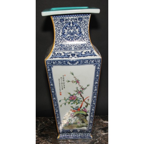 343 - A large Chinese tapered square vase, decorated in polychrome enamels with panels of fanciful birds a... 