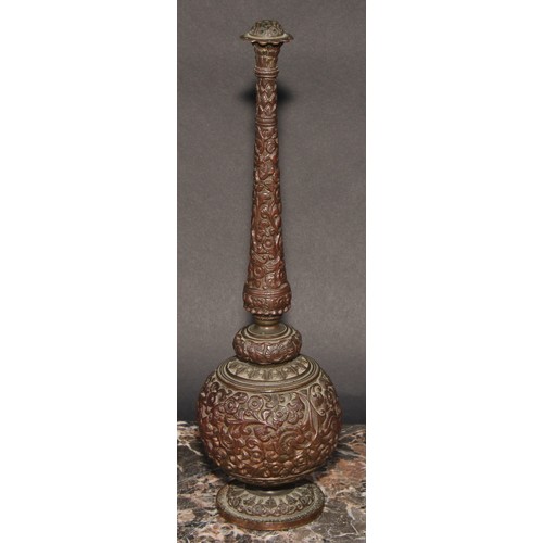 379 - An Indian bronze rosewater sprinkler, profusely cast with scrolling lotus, 28.5cm high, c.1900