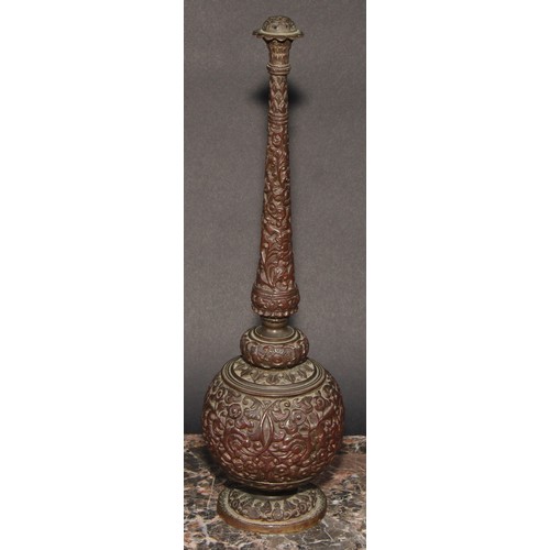 379 - An Indian bronze rosewater sprinkler, profusely cast with scrolling lotus, 28.5cm high, c.1900