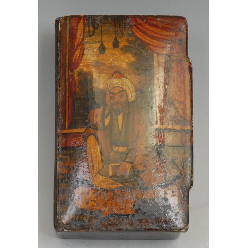 1239 - A Persian papier-mâché rectangular snuff box, hinged cover decorated with a figure of the court, sea... 