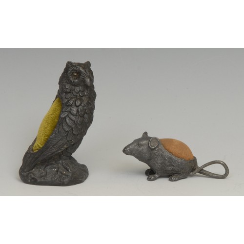 1230 - An early 20th century base metal novelty pin cushion, as an owl, 8cm high; another, as a mouse, 7cm ... 