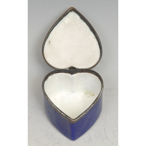 1221 - A 19th century enamel heart shaped snuff box, hinged cover decorated with a ship, 4.5cm wide