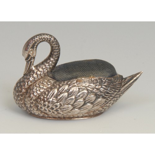 794 - An Edwardian silver novelty pin cushion, as a swan, 6cm long, Adie & Lovekin Ltd, Birmingham 1907