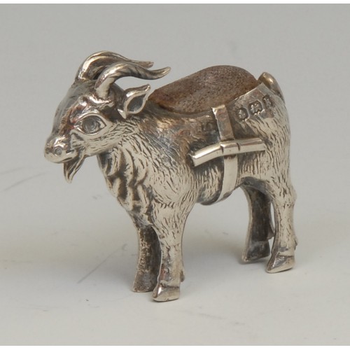 789 - An Edwardian silver novelty pin cushion, as a goat, 3.5cm long, Birmingham 1909