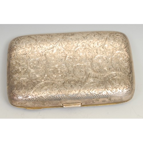 775 - An Edwardian silver curved rounded rectangular cigar case, profusely engraved with scrolling foliage... 