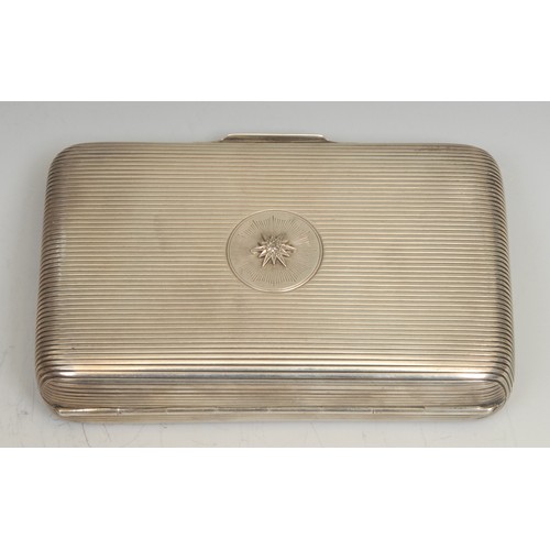 697 - A Victorian diamond set silver rounded rectangular cigar case, reeded overall, the hinged cover cent... 