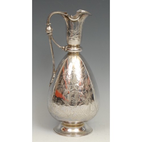 696 - A Victorian Aesthetic Movement silver wine jug, bright-cut engraved win the Japanese taste, 27.5cm h... 