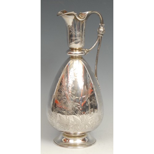 696 - A Victorian Aesthetic Movement silver wine jug, bright-cut engraved win the Japanese taste, 27.5cm h... 