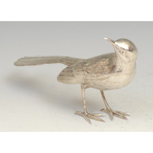 551 - A Continental cast silver novelty table decoration, a model of a bird, 17cm long, marked to tail, ea... 