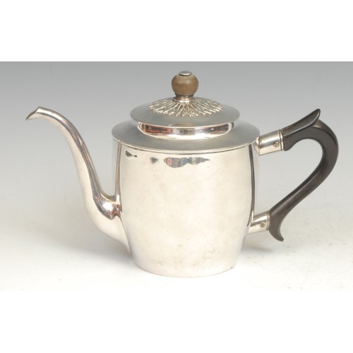 646 - A late 18th century Russian silver teapot, quite plain, push-fitting cover applied with a leafy boss... 