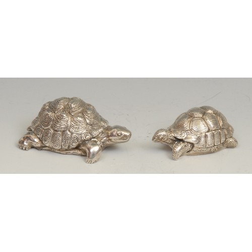 691 - A silver novelty model, of a tortoise, 7cm long, filled, marked 925; another (2)