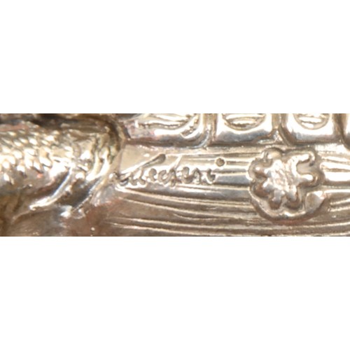 691 - A silver novelty model, of a tortoise, 7cm long, filled, marked 925; another (2)