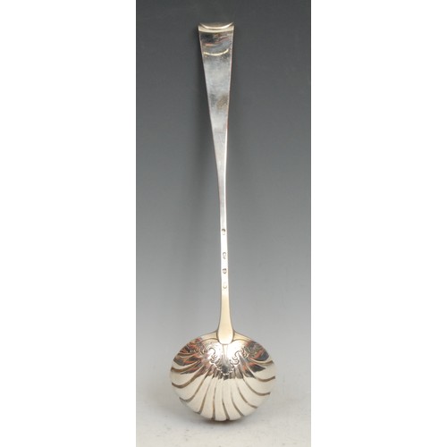 497 - A George III Irish silver Old English pattern soup ladle, shell bowl, chased stem, 36cm long, Dublin... 