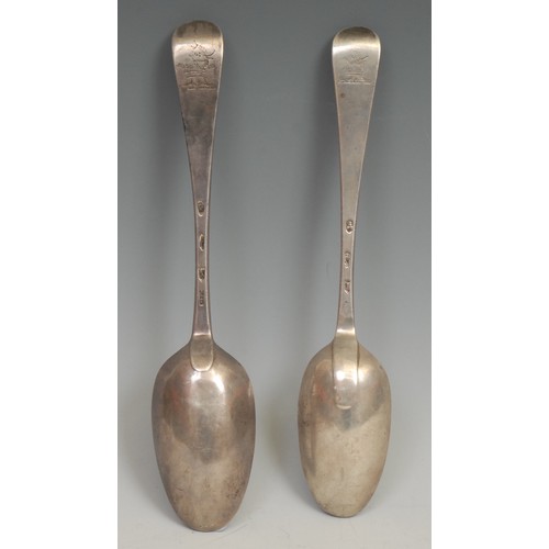 502 - A matched pair of George III Irish silver Hanoverian pattern table spoons, 22.5cm long, Dublin 1767 ... 