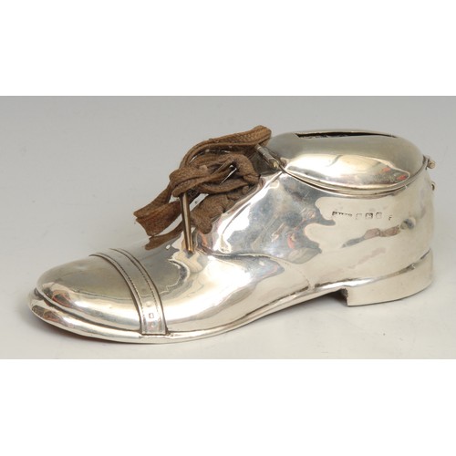 781 - An Edwardian silver novelty money box, as a shoe, hinged cover, 13cm long, S Blanckensee & Son Ltd, ... 