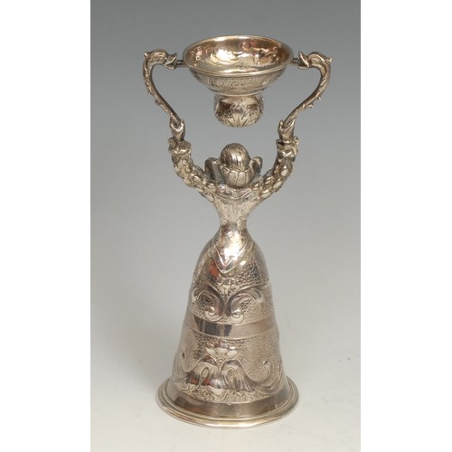 762 - An early 20th century silver wager cup, of stypical Renaissance figural style, bell to base, 15.5cm ... 