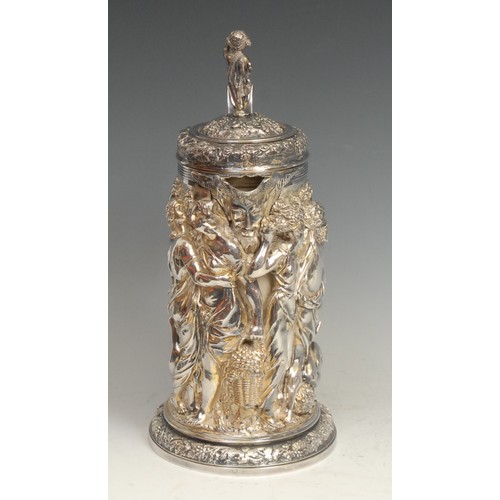 525 - A Victorian electrotype wine jug, in relief with the drunken Bacchus and followers, after a German R... 