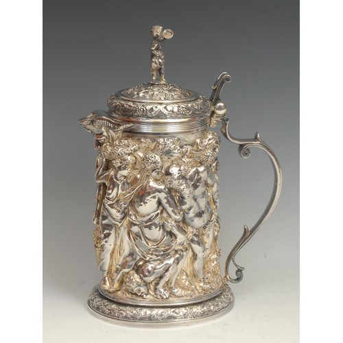 525 - A Victorian electrotype wine jug, in relief with the drunken Bacchus and followers, after a German R... 