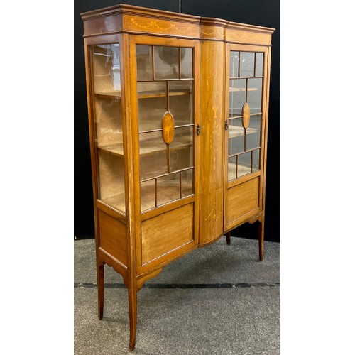 44 - An Edwardian Sheraton revival display cabinet, moulded cornice inlaid with boxwood swags and ribbons... 