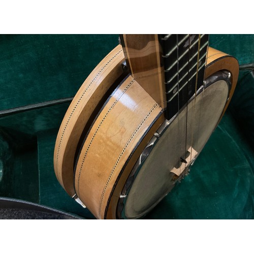 49 - A Keech banjulele banjo, with one-piece mahogany neck, aluminium frame and wooden resonator ring, th... 