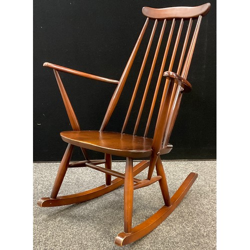 69 - An Ercol Goldsmiths Windsor rocking chair, c.1960, 87cm high.