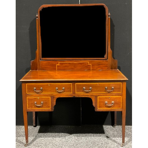 75 - An Edwardian mahogany dressing table, 159cm high, 115cm wide, 53cm deep; a similar chest, of two sho... 