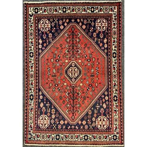 78 - A South-west Persian Abadeh rug, hand-knotted with central medallion in dark blue, within a field of... 