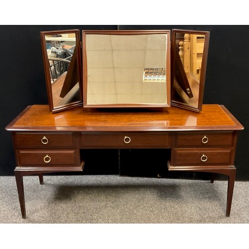 82 - A Stag mahogany dressing table, triple mirror, arrangement of five drawers to base, 128cm high x 153... 