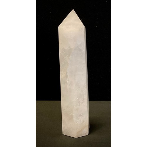 83 - A Rock crystal white quartz obelisk of slightly tapering hexagonal form, 29cm high.