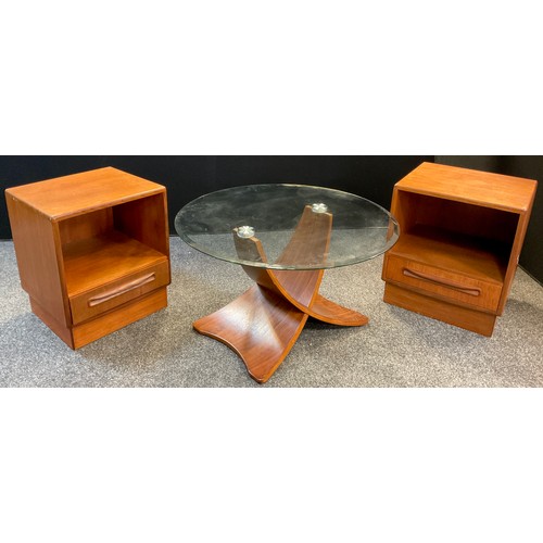 92 - Interior design - a modern design bent plywood and glass circular coffee table, 46cm high x 80cm dia... 