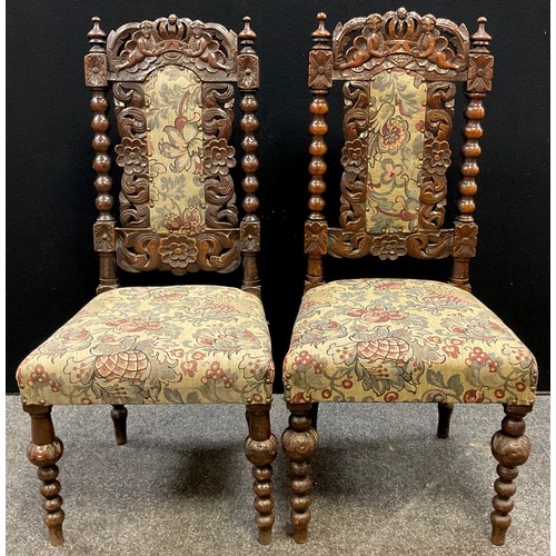 93 - A pair of Victorian Carolean Revival oak hall chairs, c.1880