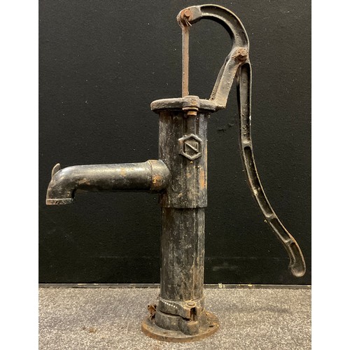 121 - A cast iron well head hand water pump, 67cm high