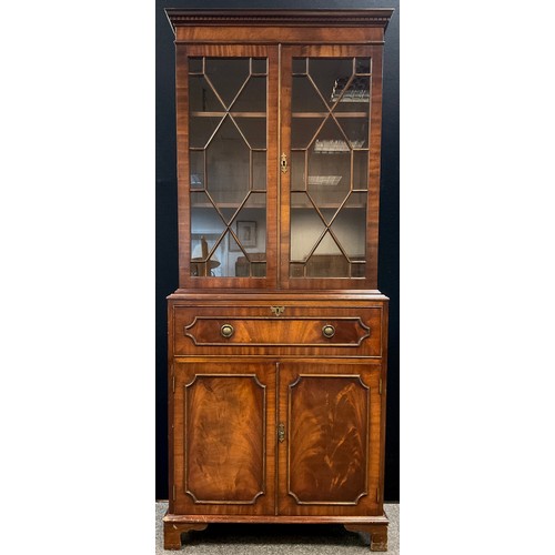 144 - A George III style mahogany Secretaire bookcase, dentil cornice, astral-glazed doors enclosing two t... 