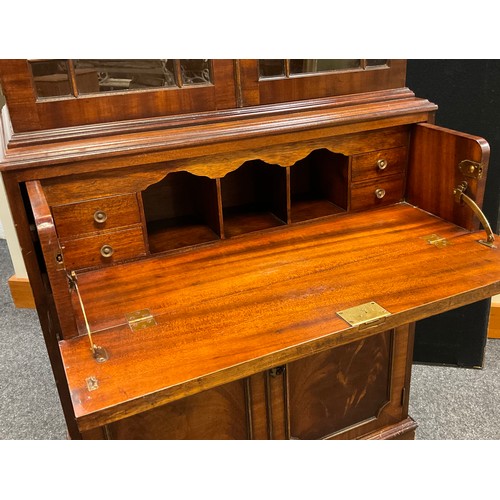 144 - A George III style mahogany Secretaire bookcase, dentil cornice, astral-glazed doors enclosing two t... 