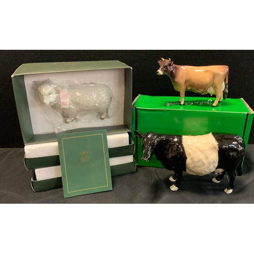 190 - Beswick Belted Galloway cow,14cm high, boxed, another similar Beswick cow, a model sheep, 15cm long ... 