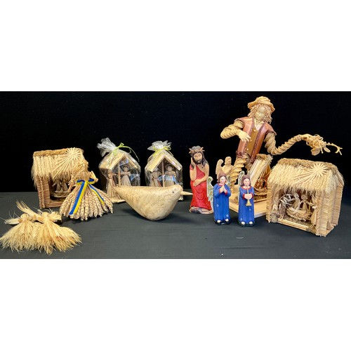 220 - A quantity of straw work pieces depicting Christmas scenes, angels and crinoline lady; etc (9)