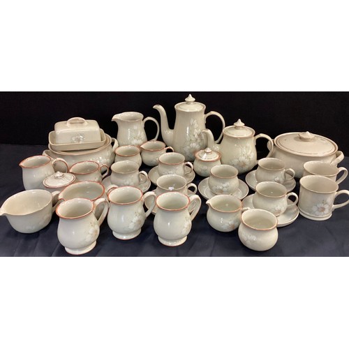 238 - A Denby Daybreak pattern dinner and table service inc tureens, plates, cups, saucers etc