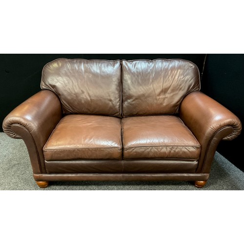 270 - A bespoke made Italian tan leather two seat sofa, 98cm high x 182cm wide x 99cm deep.