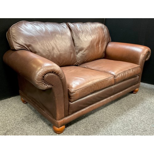 270 - A bespoke made Italian tan leather two seat sofa, 98cm high x 182cm wide x 99cm deep.